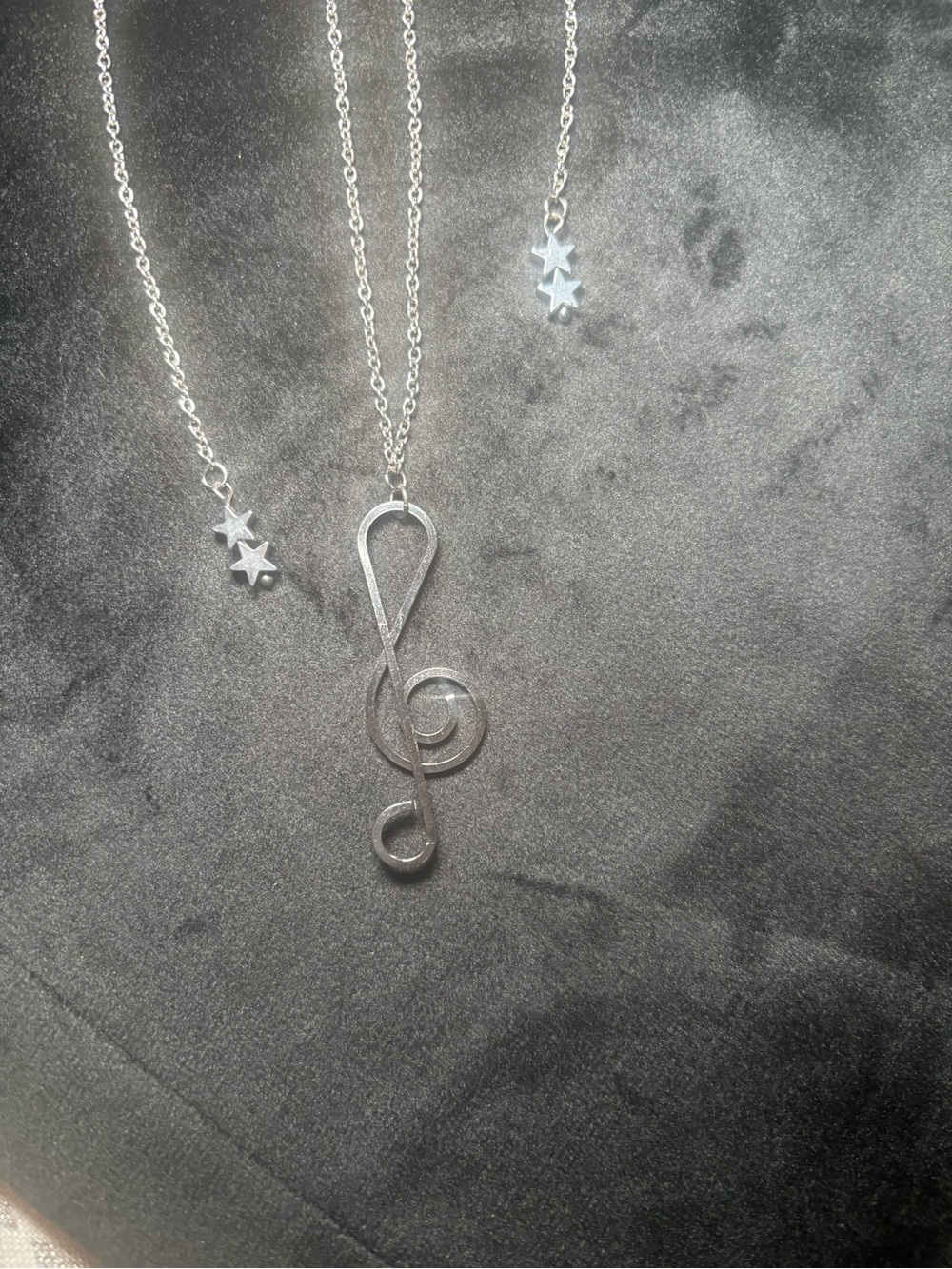 Silver Treble Clef Necklace with Star Accent Pendant